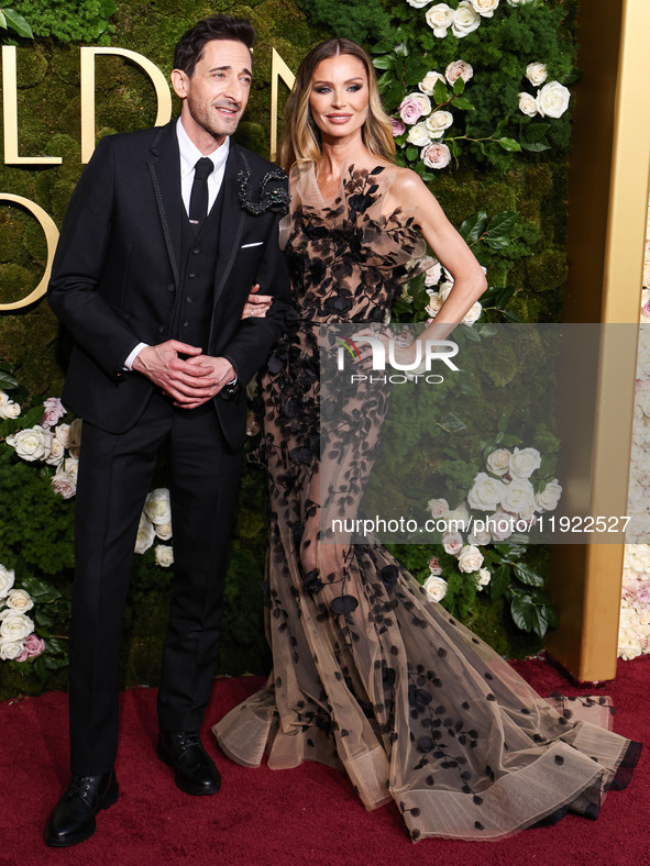 Adrien Brody and Georgina Chapman arrive at the 82nd Annual Golden Globe Awards held at The Beverly Hilton Hotel on January 5, 2025 in Bever...