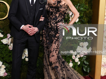 Adrien Brody and Georgina Chapman arrive at the 82nd Annual Golden Globe Awards held at The Beverly Hilton Hotel on January 5, 2025 in Bever...