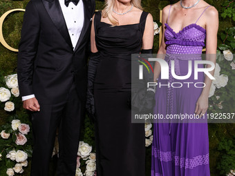 Brandon Thomas Lee, Pamela Anderson and Gia Coppola arrive at the 82nd Annual Golden Globe Awards held at The Beverly Hilton Hotel on Januar...