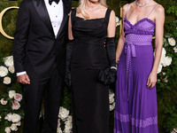 Brandon Thomas Lee, Pamela Anderson and Gia Coppola arrive at the 82nd Annual Golden Globe Awards held at The Beverly Hilton Hotel on Januar...