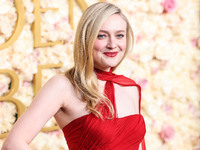 Dakota Fanning wearing custom Dolce and Gabanna arrives at the 82nd Annual Golden Globe Awards held at The Beverly Hilton Hotel on January 5...