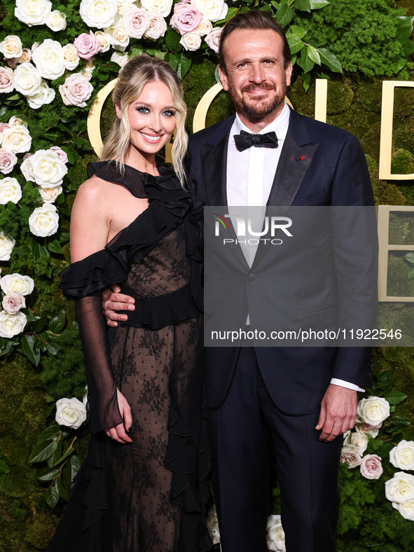 Kayla Radomski and Jason Segel arrive at the 82nd Annual Golden Globe Awards held at The Beverly Hilton Hotel on January 5, 2025 in Beverly...