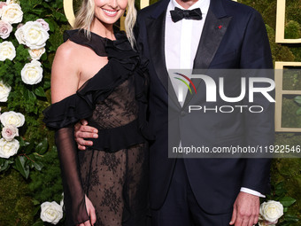 Kayla Radomski and Jason Segel arrive at the 82nd Annual Golden Globe Awards held at The Beverly Hilton Hotel on January 5, 2025 in Beverly...