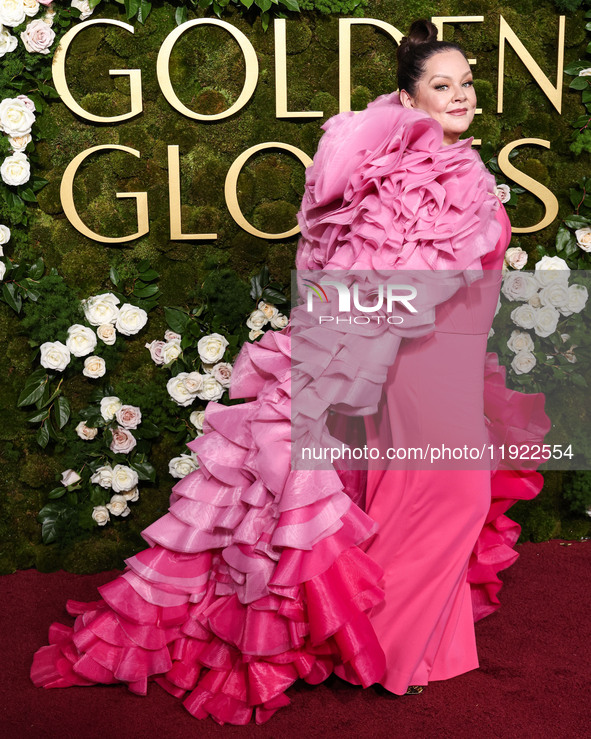 Melissa McCarthy wearing Christian Siriano arrives at the 82nd Annual Golden Globe Awards held at The Beverly Hilton Hotel on January 5, 202...