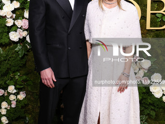 Tom Pelphrey and Kaley Cuoco arrive at the 82nd Annual Golden Globe Awards held at The Beverly Hilton Hotel on January 5, 2025 in Beverly Hi...