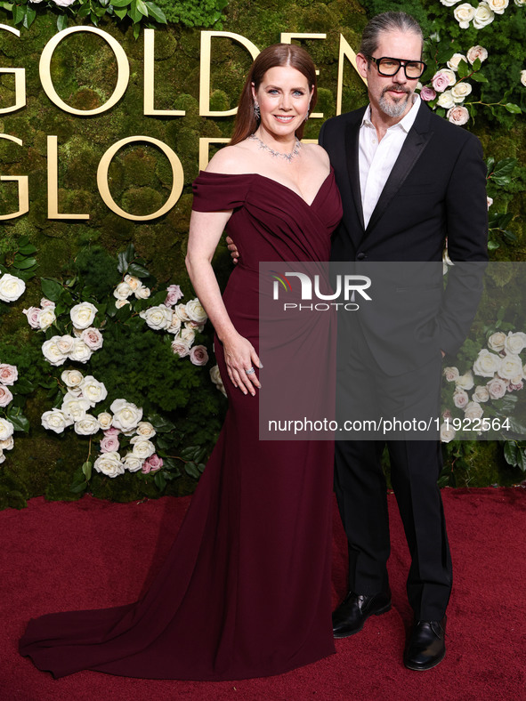 Amy Adams and Darren Le Gallo arrive at the 82nd Annual Golden Globe Awards held at The Beverly Hilton Hotel on January 5, 2025 in Beverly H...