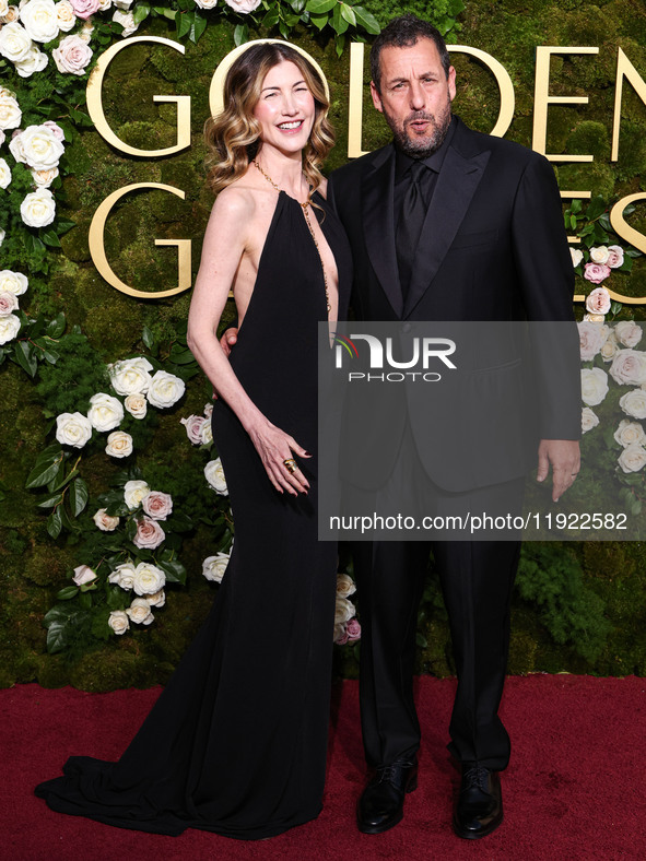 Jackie Sandler and husband Adam Sandler arrive at the 82nd Annual Golden Globe Awards held at The Beverly Hilton Hotel on January 5, 2025 in...