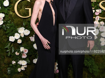 Jackie Sandler and husband Adam Sandler arrive at the 82nd Annual Golden Globe Awards held at The Beverly Hilton Hotel on January 5, 2025 in...