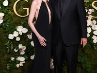 Jackie Sandler and husband Adam Sandler arrive at the 82nd Annual Golden Globe Awards held at The Beverly Hilton Hotel on January 5, 2025 in...