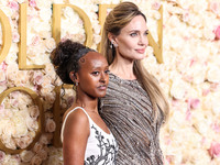 Zahara Marley Jolie and mother Angelina Jolie arrive at the 82nd Annual Golden Globe Awards held at The Beverly Hilton Hotel on January 5, 2...