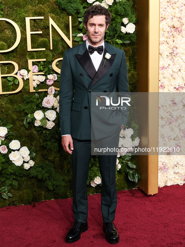 Adam Brody wearing Prada arrives at the 82nd Annual Golden Globe Awards held at The Beverly Hilton Hotel on January 5, 2025 in Beverly Hills...