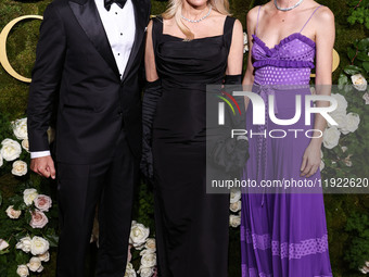 Brandon Thomas Lee, Pamela Anderson and Gia Coppola arrive at the 82nd Annual Golden Globe Awards held at The Beverly Hilton Hotel on Januar...