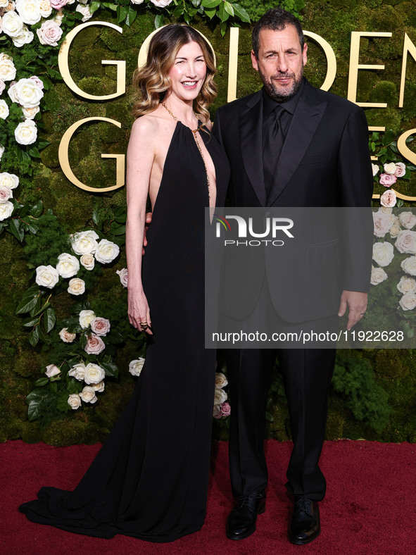 Jackie Sandler and husband Adam Sandler arrive at the 82nd Annual Golden Globe Awards held at The Beverly Hilton Hotel on January 5, 2025 in...