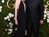 Jackie Sandler and husband Adam Sandler arrive at the 82nd Annual Golden Globe Awards held at The Beverly Hilton Hotel on January 5, 2025 in...