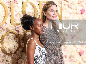 Zahara Marley Jolie and mother Angelina Jolie arrive at the 82nd Annual Golden Globe Awards held at The Beverly Hilton Hotel on January 5, 2...