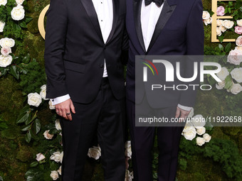 Adam Randall and Gary Oldman arrive at the 82nd Annual Golden Globe Awards held at The Beverly Hilton Hotel on January 5, 2025 in Beverly Hi...