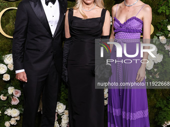 Brandon Thomas Lee, Pamela Anderson and Gia Coppola arrive at the 82nd Annual Golden Globe Awards held at The Beverly Hilton Hotel on Januar...