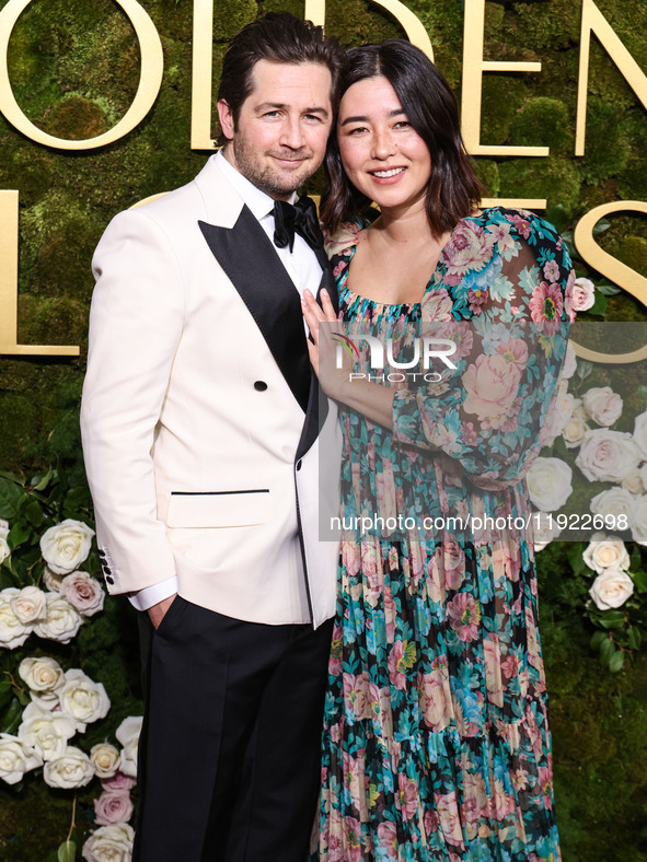 Michael Angarano and Maya Erskine arrive at the 82nd Annual Golden Globe Awards held at The Beverly Hilton Hotel on January 5, 2025 in Bever...