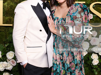 Michael Angarano and Maya Erskine arrive at the 82nd Annual Golden Globe Awards held at The Beverly Hilton Hotel on January 5, 2025 in Bever...