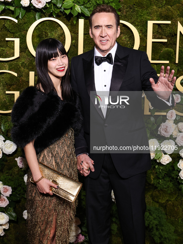 Riko Shibata and Nicolas Cage arrive at the 82nd Annual Golden Globe Awards held at The Beverly Hilton Hotel on January 5, 2025 in Beverly H...