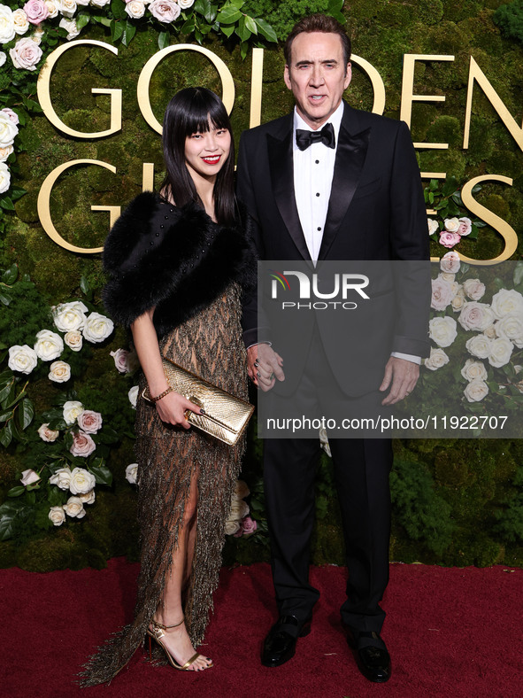 Riko Shibata and Nicolas Cage arrive at the 82nd Annual Golden Globe Awards held at The Beverly Hilton Hotel on January 5, 2025 in Beverly H...