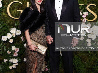 Riko Shibata and Nicolas Cage arrive at the 82nd Annual Golden Globe Awards held at The Beverly Hilton Hotel on January 5, 2025 in Beverly H...