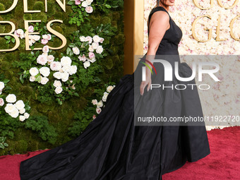 Ashley Graham wearing a custom Bach Mai dress, Gianvito Rossi shoes, and Jared jewelry arrives at the 82nd Annual Golden Globe Awards held a...