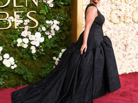 Ashley Graham wearing a custom Bach Mai dress, Gianvito Rossi shoes, and Jared jewelry arrives at the 82nd Annual Golden Globe Awards held a...