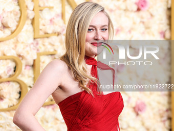 Dakota Fanning wearing custom Dolce and Gabanna arrives at the 82nd Annual Golden Globe Awards held at The Beverly Hilton Hotel on January 5...