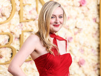 Dakota Fanning wearing custom Dolce and Gabanna arrives at the 82nd Annual Golden Globe Awards held at The Beverly Hilton Hotel on January 5...