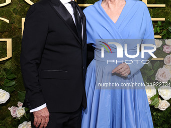 Joe Pacheco and Jean Smart arrive at the 82nd Annual Golden Globe Awards held at The Beverly Hilton Hotel on January 5, 2025 in Beverly Hill...