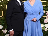 Joe Pacheco and Jean Smart arrive at the 82nd Annual Golden Globe Awards held at The Beverly Hilton Hotel on January 5, 2025 in Beverly Hill...