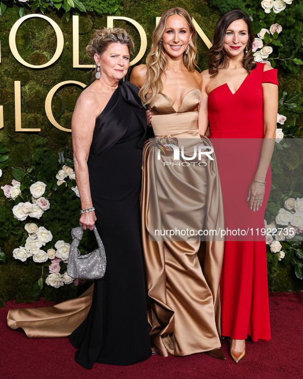 Julie Glaser, Nikki Glaser and Lauren Green arrive at the 82nd Annual Golden Globe Awards held at The Beverly Hilton Hotel on January 5, 202...