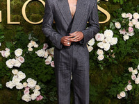 Tyler James Williams wearing Dolce and Gabanna arrives at the 82nd Annual Golden Globe Awards held at The Beverly Hilton Hotel on January 5,...