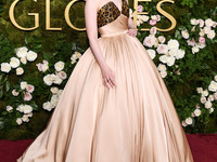 Elle Fanning wearing custom Balmain arrives at the 82nd Annual Golden Globe Awards held at The Beverly Hilton Hotel on January 5, 2025 in Be...