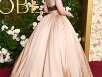 Elle Fanning wearing custom Balmain arrives at the 82nd Annual Golden Globe Awards held at The Beverly Hilton Hotel on January 5, 2025 in Be...