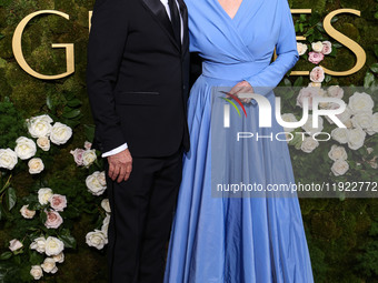 Joe Pacheco and Jean Smart arrive at the 82nd Annual Golden Globe Awards held at The Beverly Hilton Hotel on January 5, 2025 in Beverly Hill...