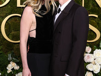 Kirsten Dunst and husband Jesse Plemons arrive at the 82nd Annual Golden Globe Awards held at The Beverly Hilton Hotel on January 5, 2025 in...