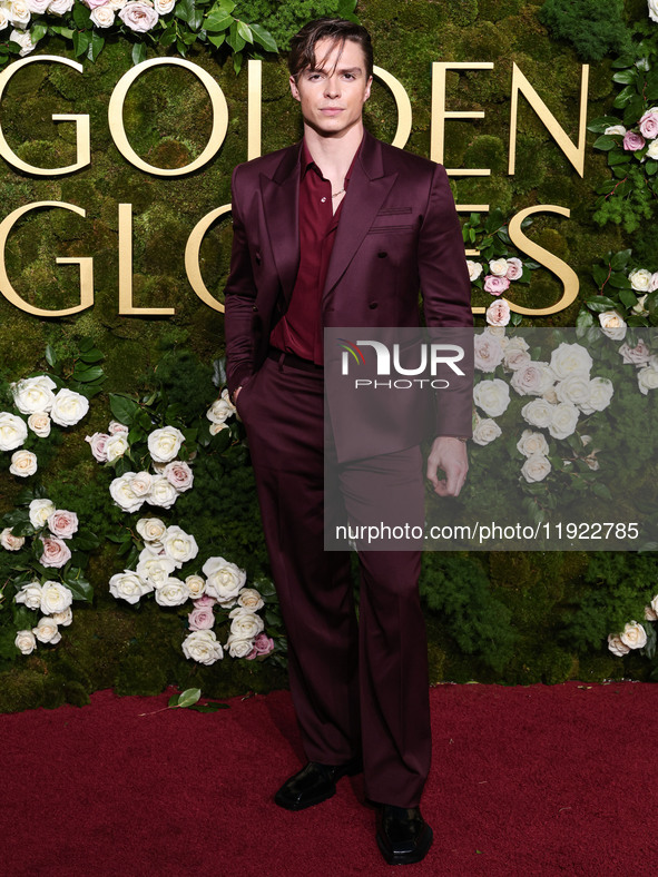 Nicholas Alexander Chavez wearing Versace with Christian Louboutin boots arrives at the 82nd Annual Golden Globe Awards held at The Beverly...