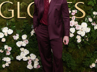 Nicholas Alexander Chavez wearing Versace with Christian Louboutin boots arrives at the 82nd Annual Golden Globe Awards held at The Beverly...