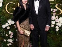 Riko Shibata and Nicolas Cage arrive at the 82nd Annual Golden Globe Awards held at The Beverly Hilton Hotel on January 5, 2025 in Beverly H...