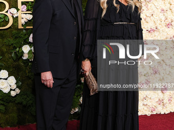 Tim Bagley and Jennifer Coolidge arrive at the 82nd Annual Golden Globe Awards held at The Beverly Hilton Hotel on January 5, 2025 in Beverl...