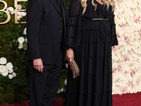 Tim Bagley and Jennifer Coolidge arrive at the 82nd Annual Golden Globe Awards held at The Beverly Hilton Hotel on January 5, 2025 in Beverl...