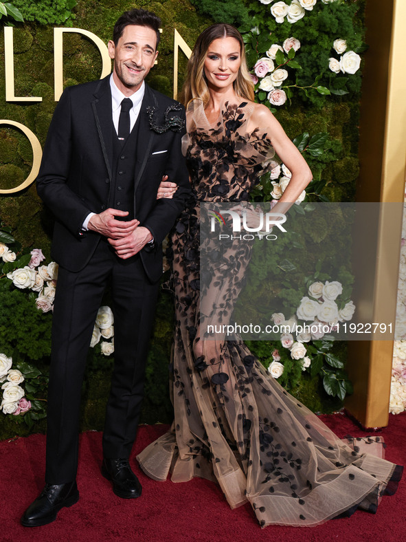 Adrien Brody and Georgina Chapman arrive at the 82nd Annual Golden Globe Awards held at The Beverly Hilton Hotel on January 5, 2025 in Bever...