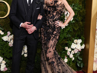 Adrien Brody and Georgina Chapman arrive at the 82nd Annual Golden Globe Awards held at The Beverly Hilton Hotel on January 5, 2025 in Bever...