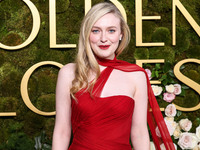 Dakota Fanning wearing custom Dolce and Gabanna arrives at the 82nd Annual Golden Globe Awards held at The Beverly Hilton Hotel on January 5...