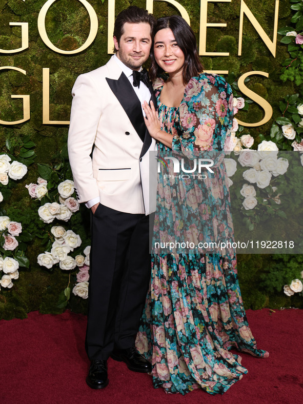 Michael Angarano and Maya Erskine arrive at the 82nd Annual Golden Globe Awards held at The Beverly Hilton Hotel on January 5, 2025 in Bever...