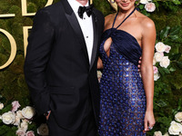 Miles Teller and Keleigh Sperry arrive at the 82nd Annual Golden Globe Awards held at The Beverly Hilton Hotel on January 5, 2025 in Beverly...