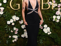 Miley Cyrus wearing Celine with Da Beers jewelry arrives at the 82nd Annual Golden Globe Awards held at The Beverly Hilton Hotel on January...