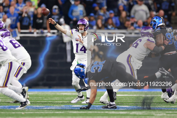 DETROIT,MICHIGAN-JANUARY 5:  Quarterback Sam Darnold (14) of the Minnesota Vikings throws the ball during a game between the Detroit Lions a...